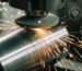 What are special material challenges in bearing steel grinding?